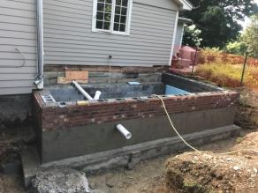 Masonry foundation for addition